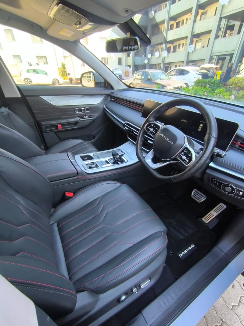 Jetour Dashing interior after a full interior detail, black leather with red stitching and cleaned trim