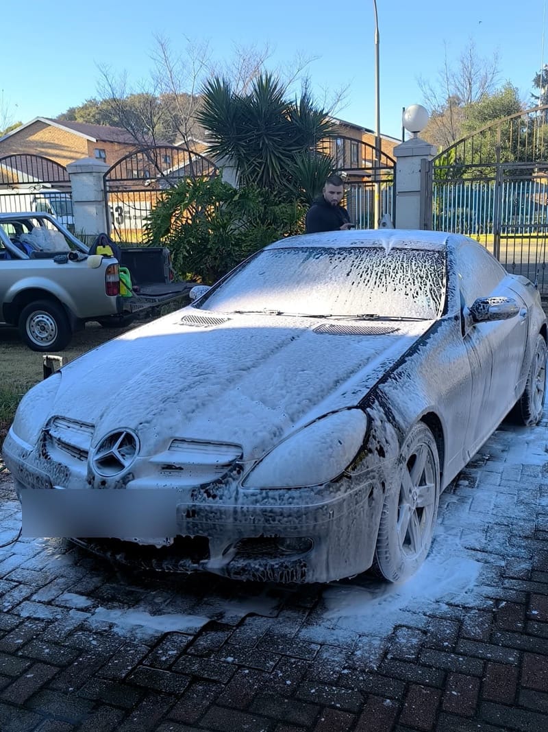 Mercedes-Benz SLK under snow foam during the pre-wash stage, the same car photographed again once finished